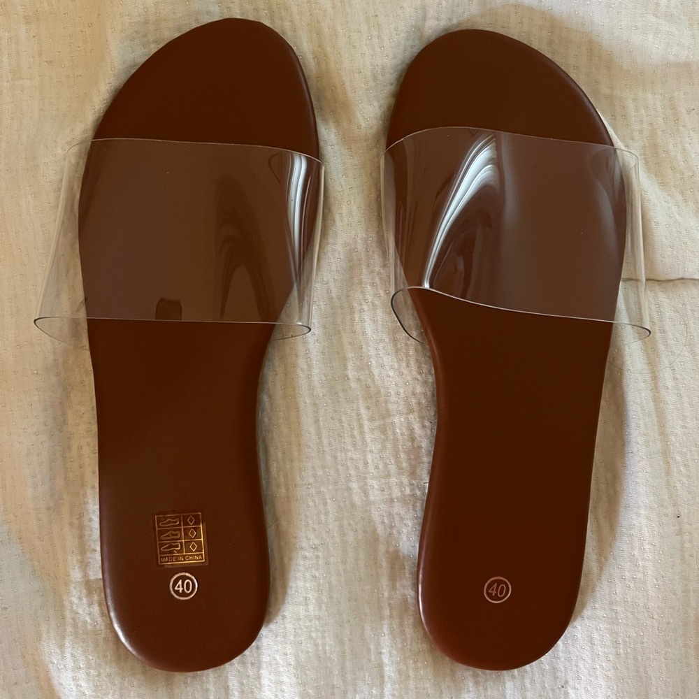 Never worn clear slides